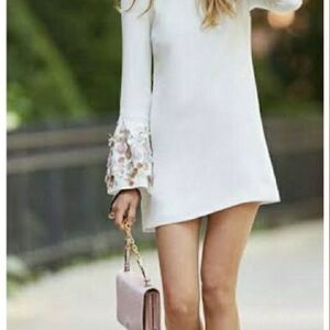 Elegant White Dress with Floral Sleeves